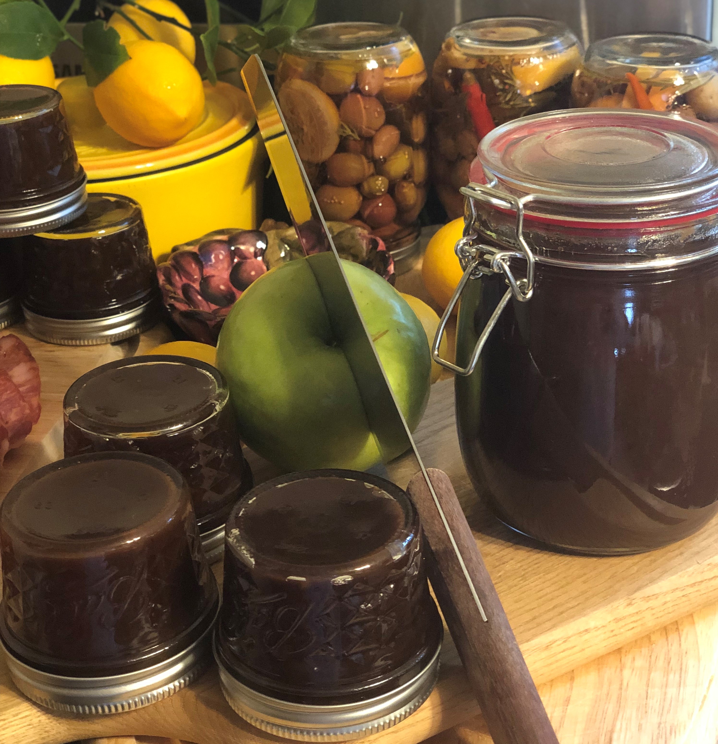Jars of tamarind jam with fruit